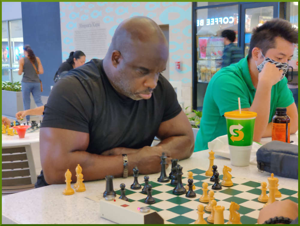 May 4th, 2021. Ramon playing chess at Ka Makana Alii.