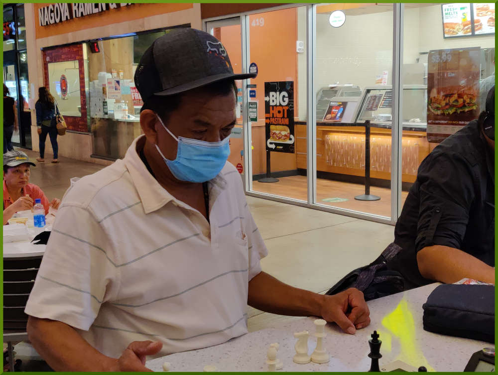 May 4th, 2021. Eddie playing chess at Ka Makana Alii.