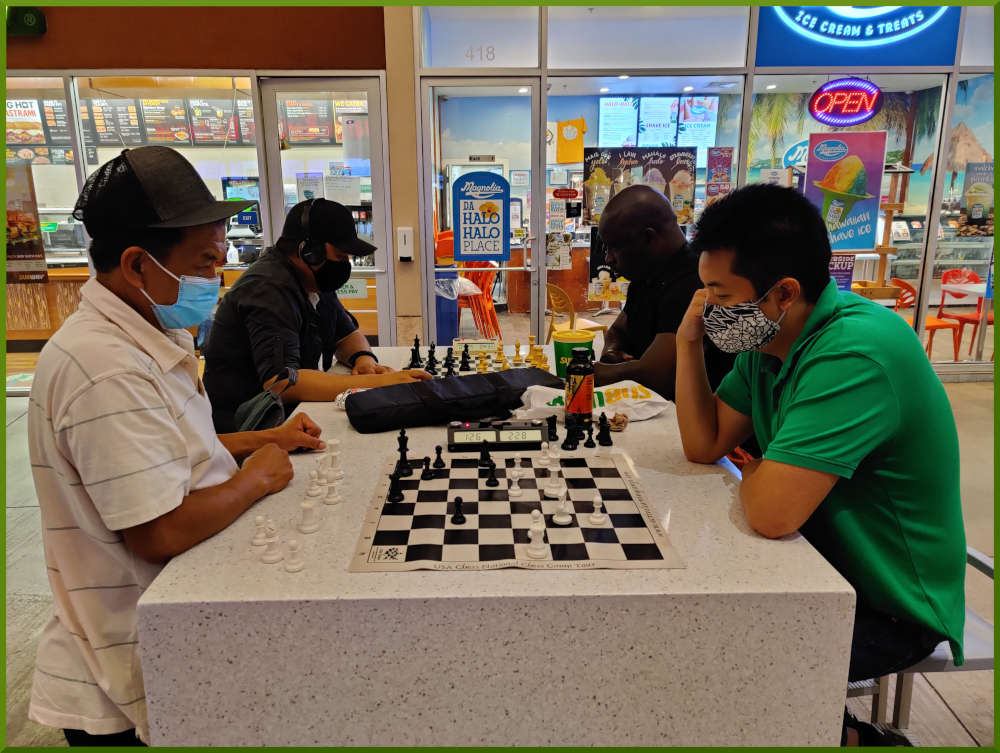 May 4th, 2021. Eddie, Shaun, Nick, and Ramon playing chess at Ka Makana Alii.