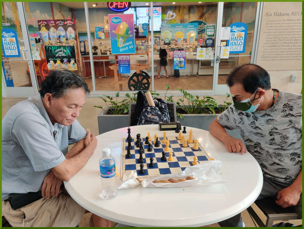 February 23rd, 2021. Eddie focuses on the game while Bob focuses on the food.