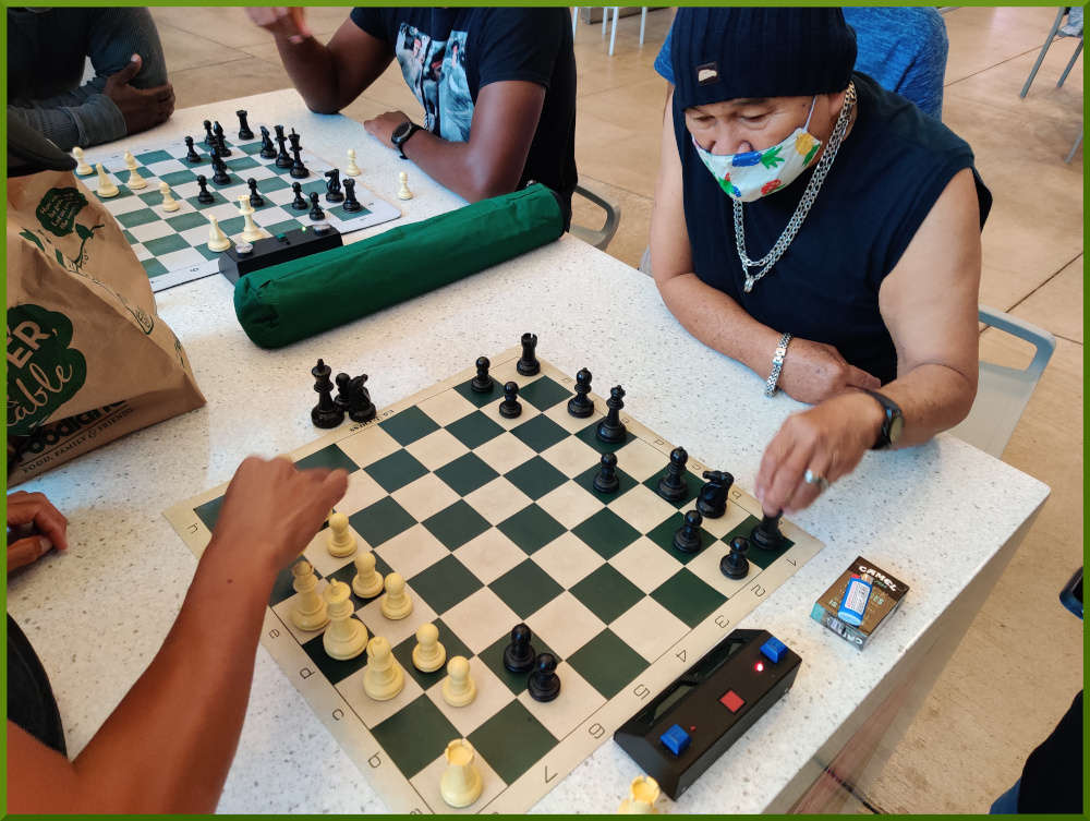 March 2nd, 2021. Aro playing chess at Ka Makana Alii foodcourt.