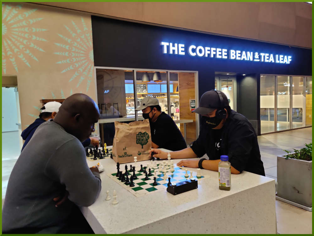 March 2nd, 2021. People playing chess at Ka Makana Alii foodcourt.