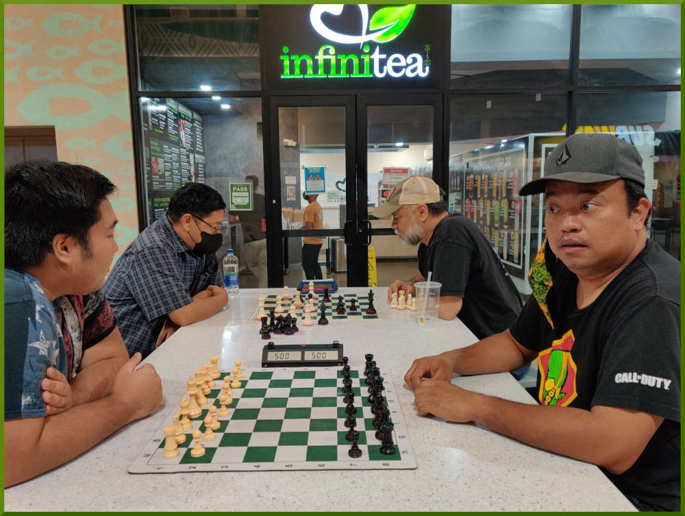 April 26th, 2022. Ka Makana Alii chess meetup. Ceazar vs Jeremy (near board). Jose vs Chet (far board).