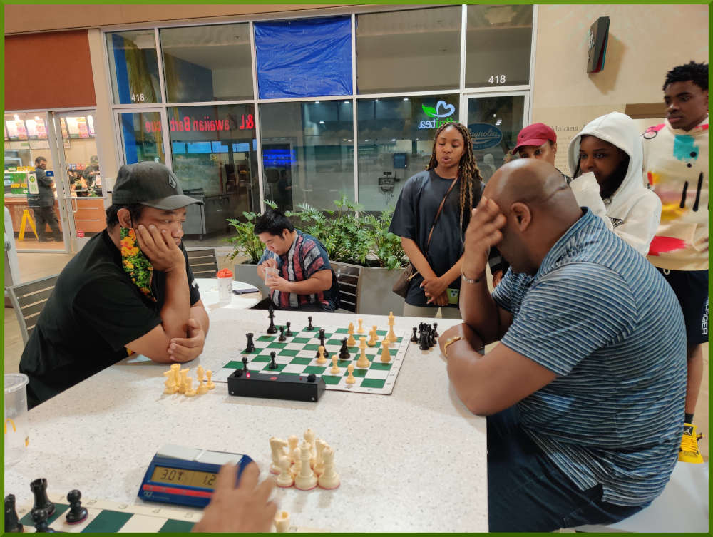 April 26th, 2022. Ka Makana Alii chess meetup. Jeremy is challenged by someone visiting the state.