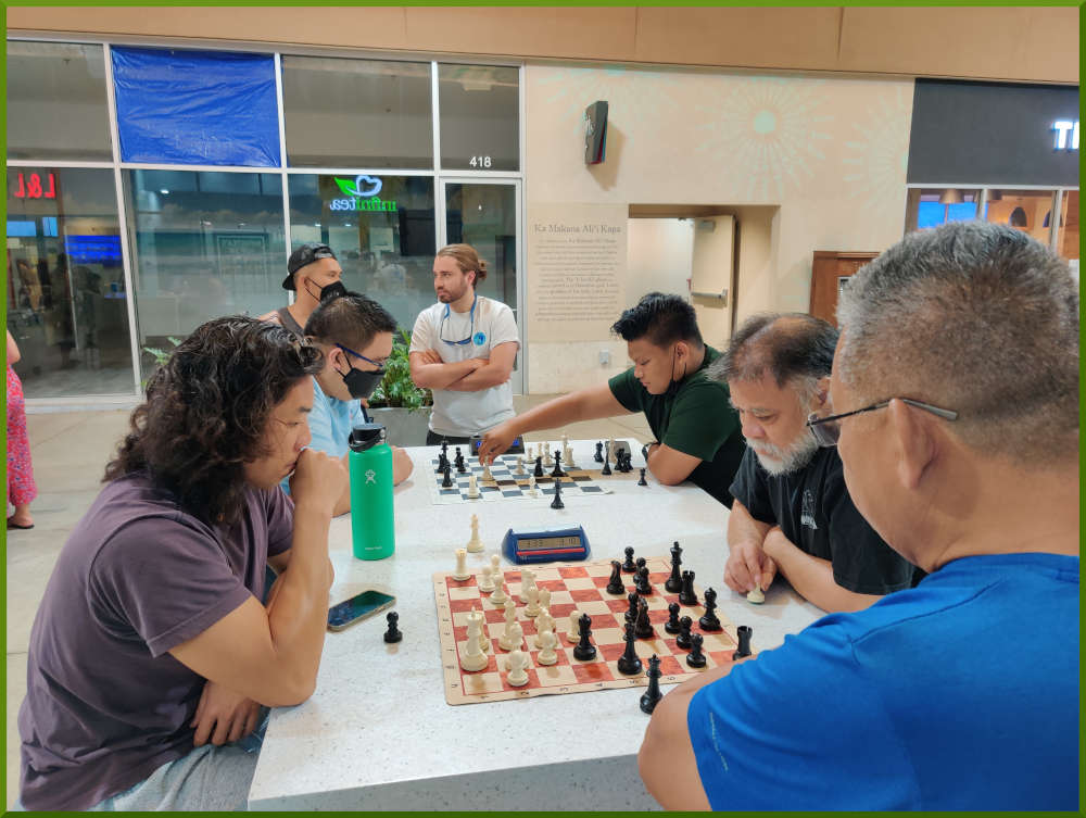 May 10th, 2022. Ka Makana Alii chess meetup. Tony vs Chet (near board). John vs Prince (far board).