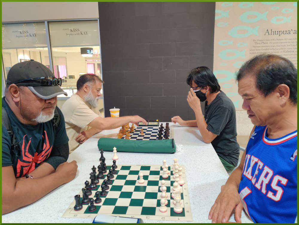 July 26th, 2022. Ka Makana Alii chess meetup. Fred vs Eddie (near board). Chet vs Regie (far board).