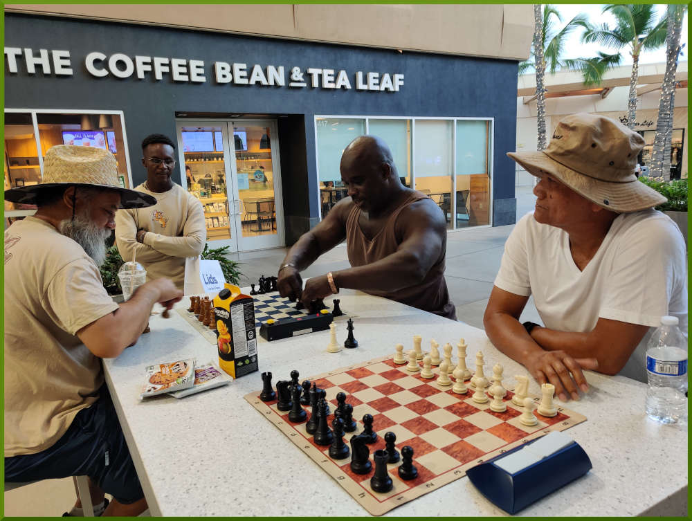 August 30th, 2022. Ka Makana Alii chess meetup. Edgar waiting for a challenger. Chet vs Ramon (far board).