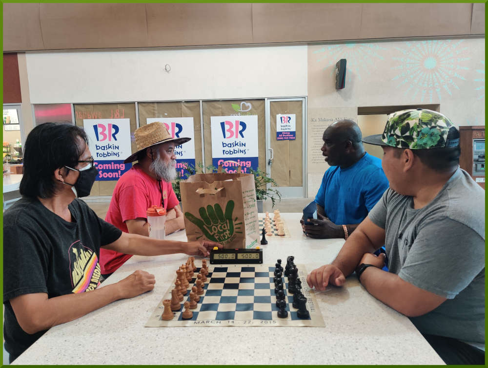 September 6th, 2022. Ka Makana Alii chess meetup. Regie vs Ceazar (near board). Chet vs Ramon (far board).