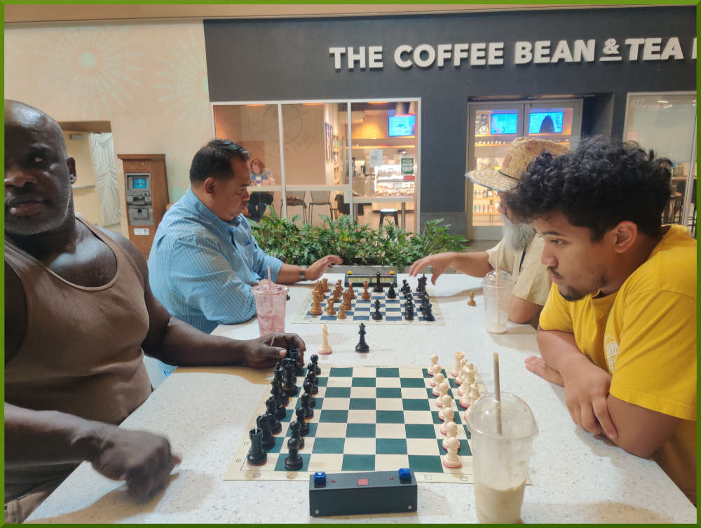 September 13th, 2022. Ka Makana Alii chess meetup. Ramon vs Christian (near board). Richard vs Chet (far board).
