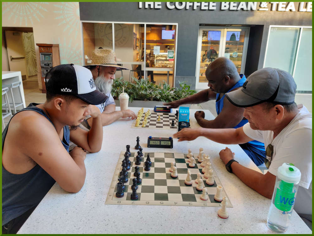 September 27th, 2022. Ka Makana Alii chess meetup. Shane vs Edgar (near board). Chet vs Ramon (far board).