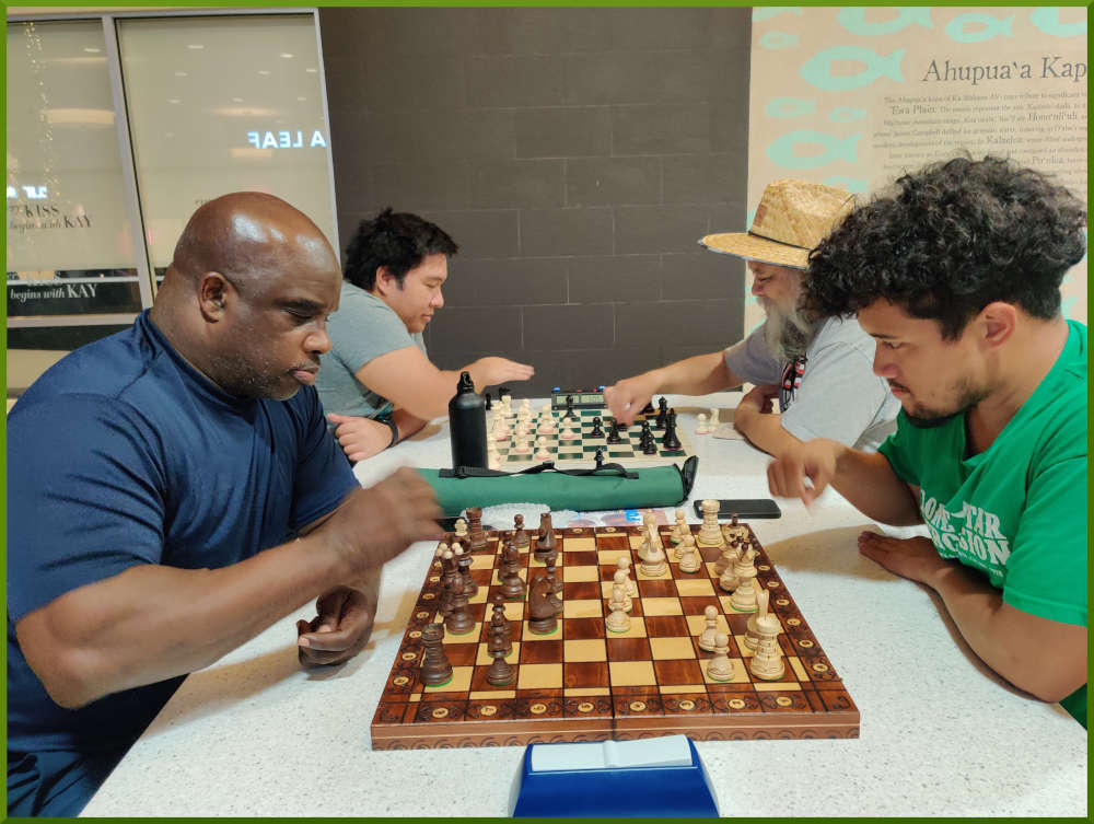 November 8th, 2022. Ka Makana Alii chess meetup. Ramon vs Christian (near board). Ceazar vs Chet (far board).